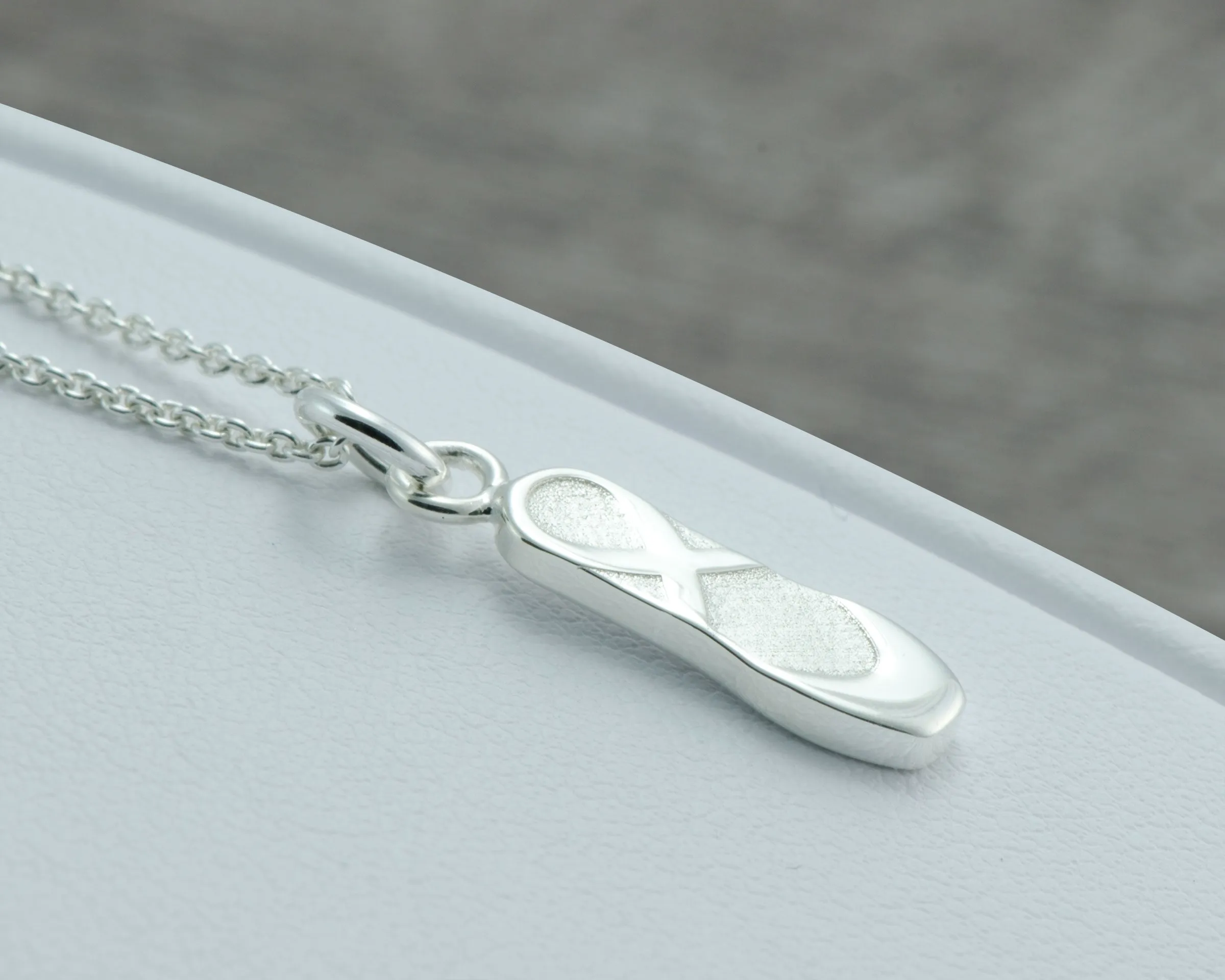 BALLET NECKLACE IN STERLING SILVER