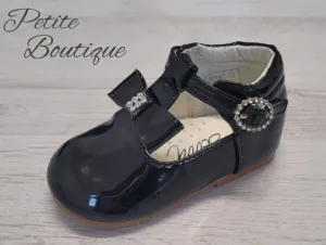 Black patent t-bar shoes
