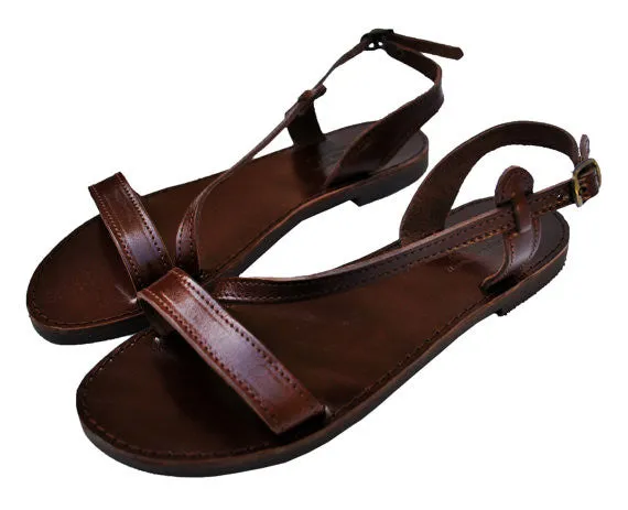 Dark brown leather sole Niki fashion sandals with wide front strap.