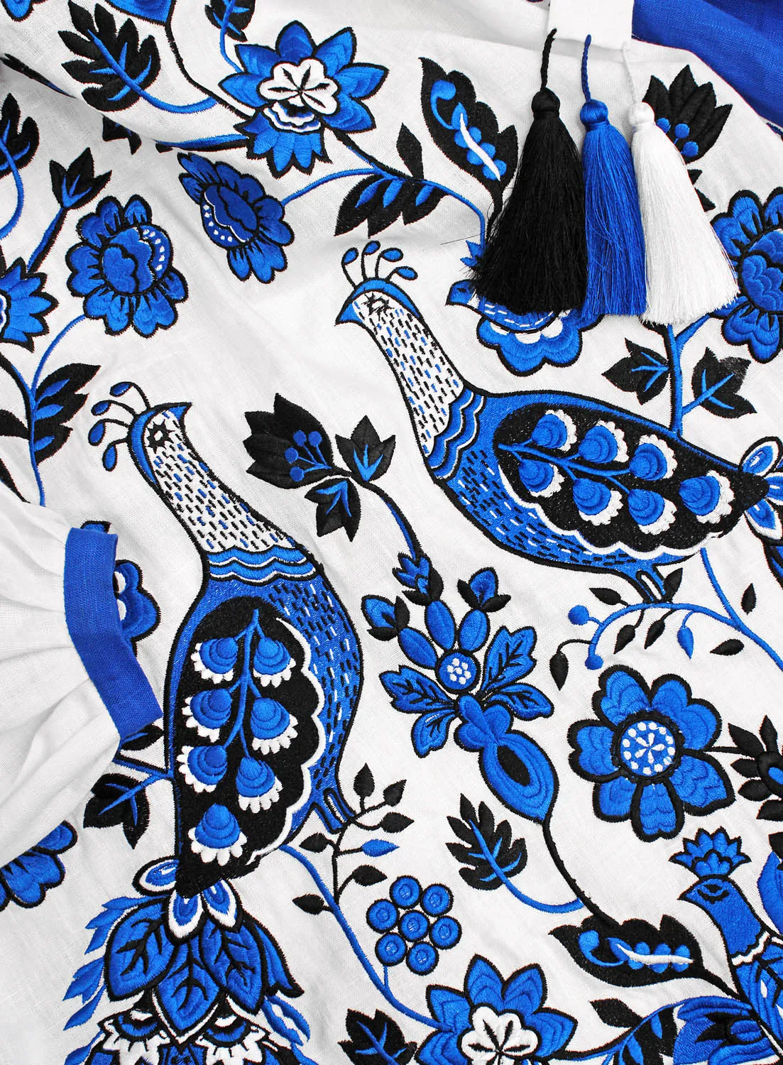 Kaftan with embroidered peacocks